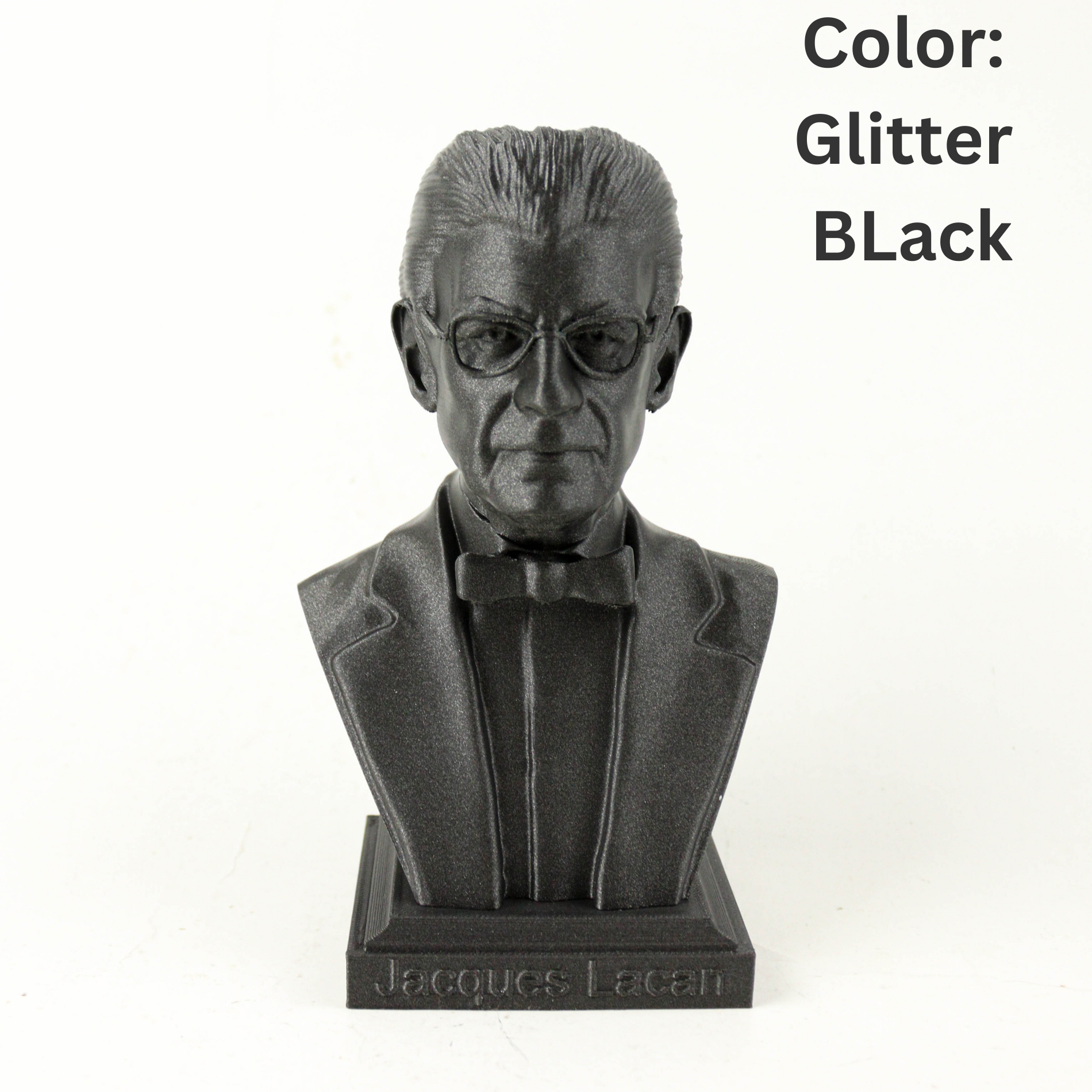 A black bust of a man wearing a suit and bow tie, with the text "Color: Glitter Black" above it.