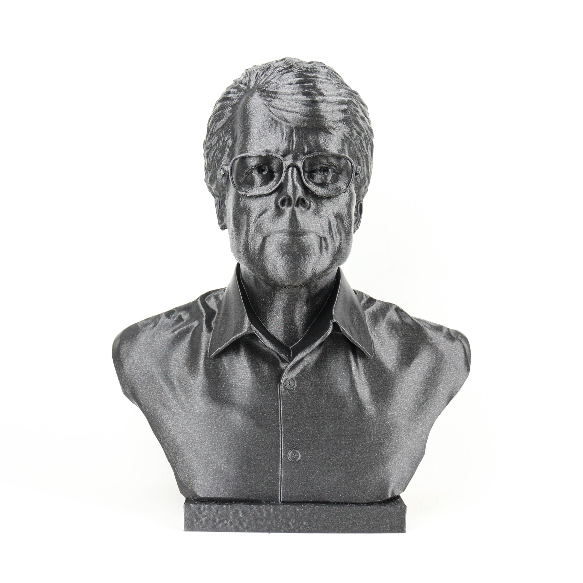 A black and white image of a bust sculpture depicting a man wearing glasses.